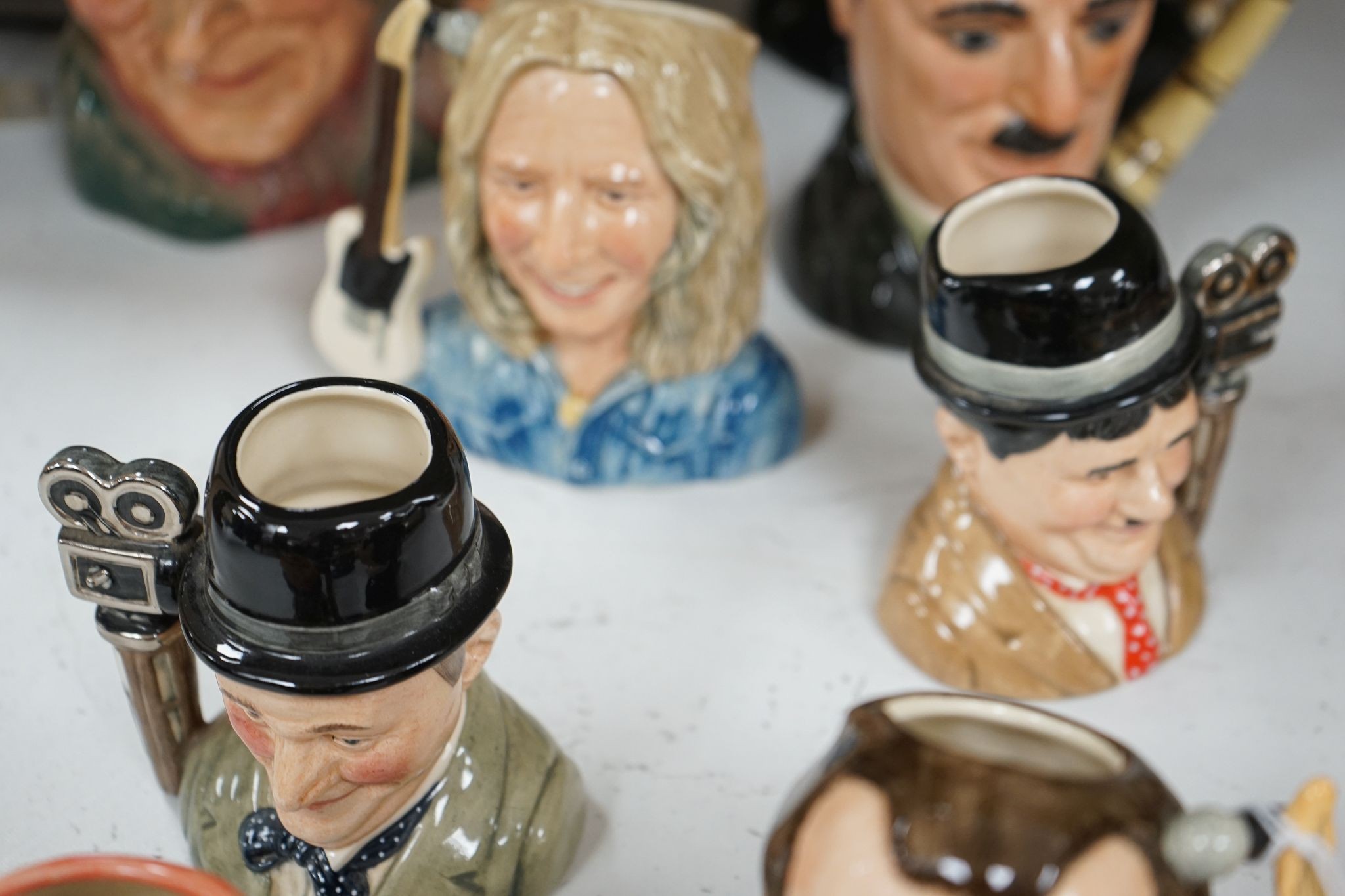 A collection of Royal Doulton character jugs, most boxed